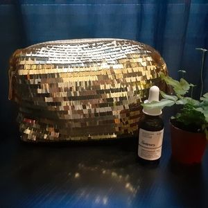 Gold makeup bag